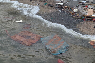 Household waste on the seashore