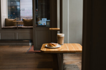 coffee and pastry on a table in a cafe