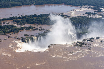 Obraz premium Beautiful aerial view to Iguassu Falls and rainforest from helicopter