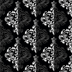 Floral pattern. Vintage wallpaper in the Baroque style. Seamless vector background. White and black ornament for fabric, wallpaper, packaging. Ornate Damask flower ornament
