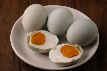 telur Asin is salted duck eggs. telur Asin are eggs made by soaking duck eggs in a salt solution. Indonesian food. 