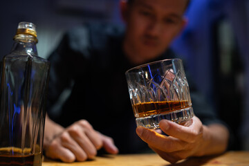 Barman pouring whiskey whiskey glass beautiful night