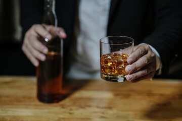 Barman pouring whiskey whiskey glass beautiful night