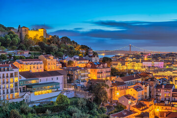 Lisbon Portugal sunset city skyline at Lisbon Baixa district and Saint George Castle - obrazy, fototapety, plakaty
