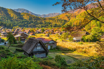 Shirakawago village Gifu Japan, Historical Japanese traditional Gassho house at Shirakawa village in autumn foliage season - 647978839