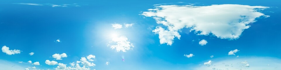 blue sky panorama with puffy clouds, for compositing in 3D graphics and aerial spherical panoramas...