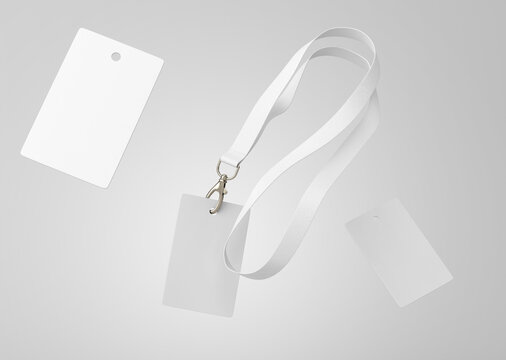 white plain empty blank floating vertical employee ID card holders with lanyard on isolated background