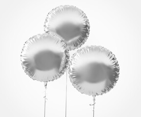 white blank empty plain sliver metallic round foil balloons with string on isolated background