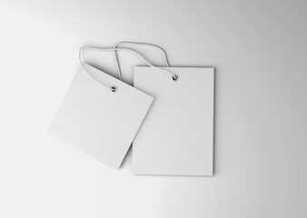 white plain empty blank two square and vertical rectangular hanging label price tag with string on isolated background