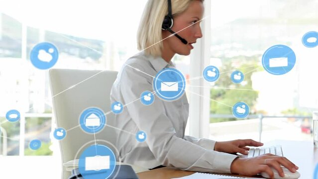 Animation of connected icons over caucasian customer service agent talking and working on desktop