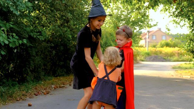 Halloween holiday children in costumes. Selective focus.