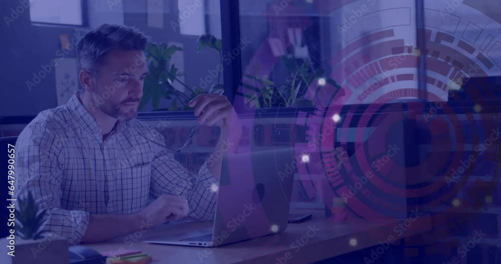 Poster animation of loading circles over thoughtful caucasian man analyzing reports on laptop in office