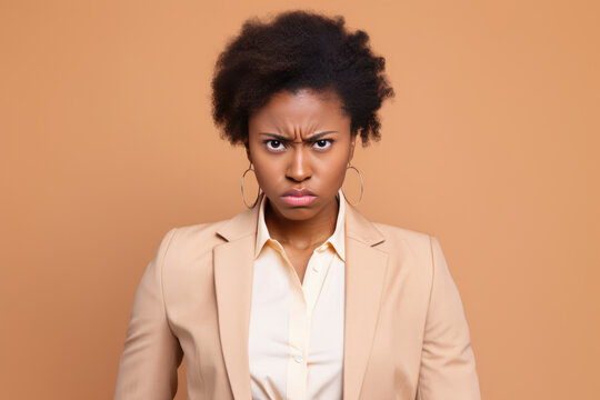 A Woman In A Suit With A Surprised Look On Her Face