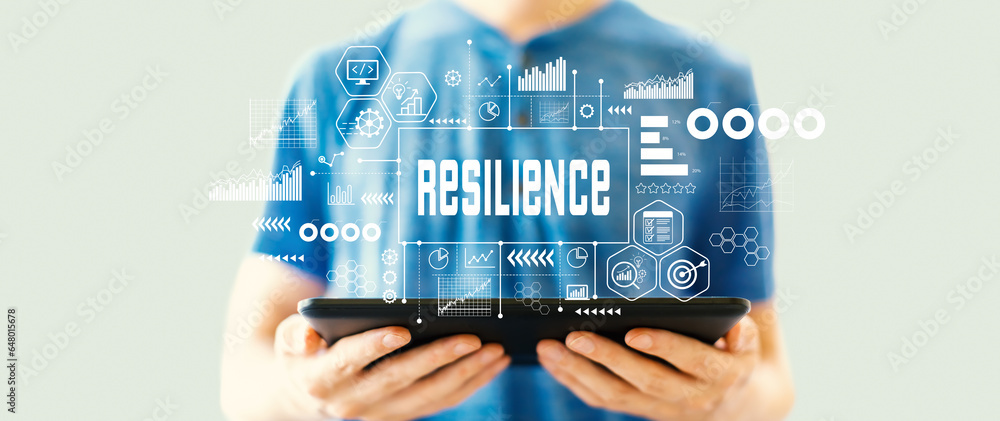 Poster resilience theme with young man using a tablet computer