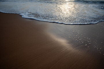 Soft wave of the sea on the sandy beach
