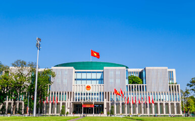 National Assembly Building of Vietnam with blue sky background and its green courtyard at the...