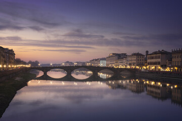 Carraia medieval Bridge on Arno river at sunset. Florence, Italy