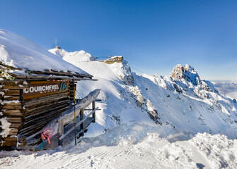 Courchevel ski slopes view from top gondola station. 