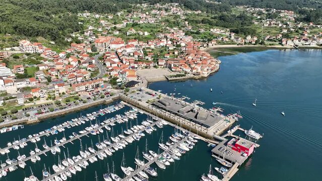 Elevated  Drone View of Combarro Harbor and Docked Boats