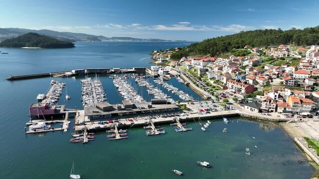 Green Waters: Aerial Orbit of Combarro Harbor