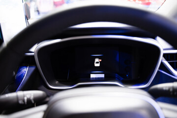 View the digital instrument cluster LED screen through your car's steering wheel