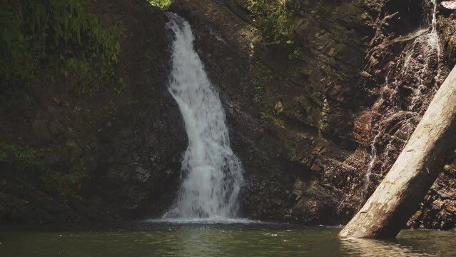 Amazing view of a waterfall in the middle of the rainforest