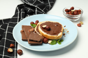 Fototapeta na wymiar Bread with chocolate paste - tasty breakfast or morning food
