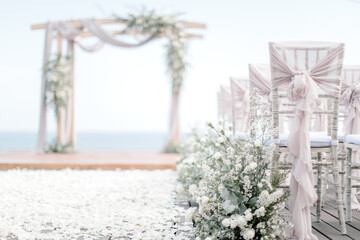 Decorations for the wedding ceremony,
wedding arch on the background of the sea