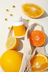 Bio-supplement vitamin C, in tablets on a light background.