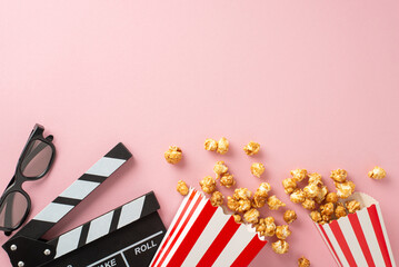 Fototapeta na wymiar Gathered with friends for a film night. Overhead view of cheese and caramel popcorn in striped containers, 3D glasses, and a clapperboard on a pastel pink surface for text or movie ad