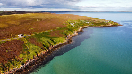 Aerial shot of Waulkmill Bay, Orkney at high tide