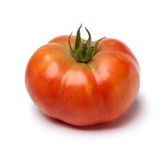 Whole single Galapagos tomato isolated on white background close up