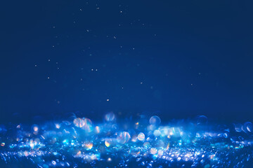 Fototapeta na wymiar Glowing in the dark defocused pearl glitter texture. Christmas and winter holidays background