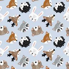 Seamless vector pattern with cute woodland animal heads. Perfect for textile, wallpaper or print design.