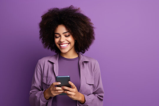 woman with phone on purple background .