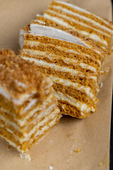 multi-layer cake with sponge cake with honey and buttercream - 648088882