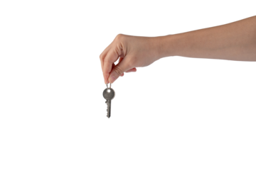 Key with a ring in hand on a transparent background.