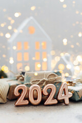 Christmas and New Year card. Number 2024 on holiday background. Christmas lights bokeh background. Holiday postcard. Happy New Year 2024 Card Concept - 648098251