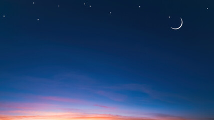 Night sky background with crescent moon and star on beautiful romantic twilight sky in widescreen view
