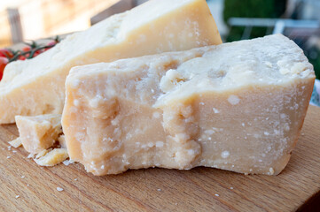 Traditional italian food - 36 months aged in caves Italian parmesan hard cheese from...