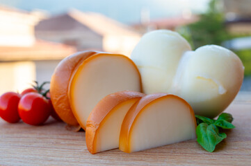 Italian semi hard handmade smoked scamorza cheese, from cow milk from Apulia or Calabria regions...