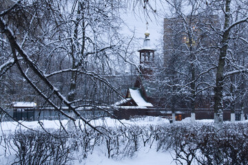 Landscape with Orthodox church in winter