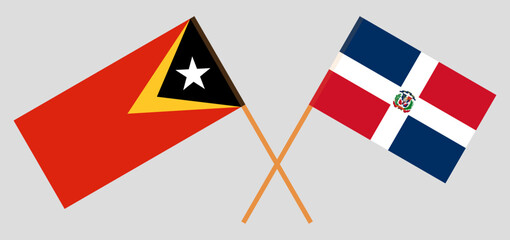 Crossed flags of East Timor and Dominican Republic. Official colors. Correct proportion