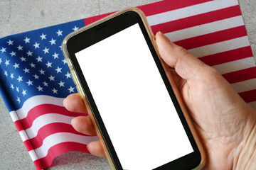 american flag and mobile phone in hand with white blank, Copy sauce for your ads