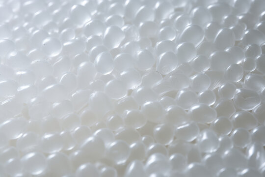 Mesmerizing Waves of Shiny LDPE: A Versatile, Water-Resistant Synthetic Material with a Smooth and Lightweight Texture.