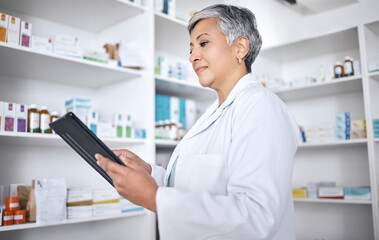 Naklejka na ściany i meble Tablet, medicine pharmacist and woman research, search or reading online product description, drugs or medical stock. Clinic, mature pharmacy worker or check supplement, healthcare data or pills info