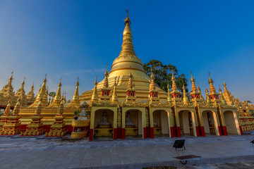 background of the pagoda(Wat Suwan Khiri),Phutthasuwan Chedi, built for people or tourists to come to make merit and take pictures without having to seek permission while traveling in Ranong,Thailand.