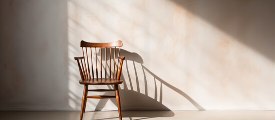 Wooden chair with shadow on white background