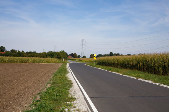Country road through hilly polish landscape and field. Sleza Mountain, Poland, Wroclaw