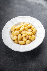 gnocchi raw potato food second course cooking appetizer meal food snack on the table copy space food background rustic top view keto or paleo diet